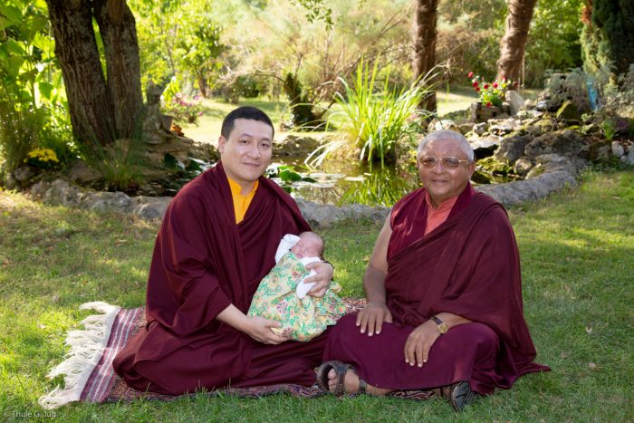 Thaye Dorje, His Holiness the 17th Gyalwa Karmapa, rests with Jigme Rinpoche, Karmapa's General Secretary, while Thugsey (Karmapa's son) also takes a rest